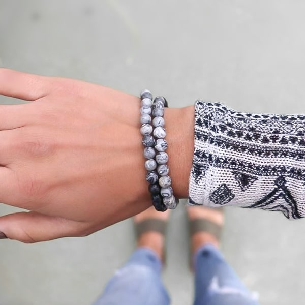Beaded map stone bracelet on a woman's wrist