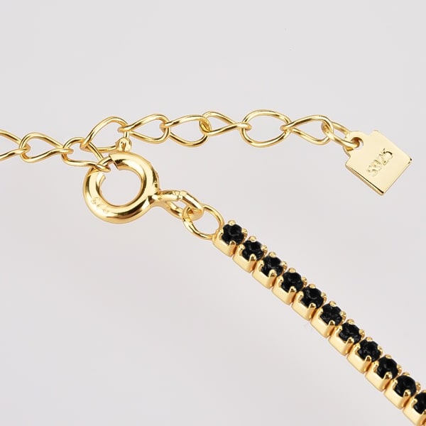 Details of the gold tennis choker necklace with black cubic zirconia stones