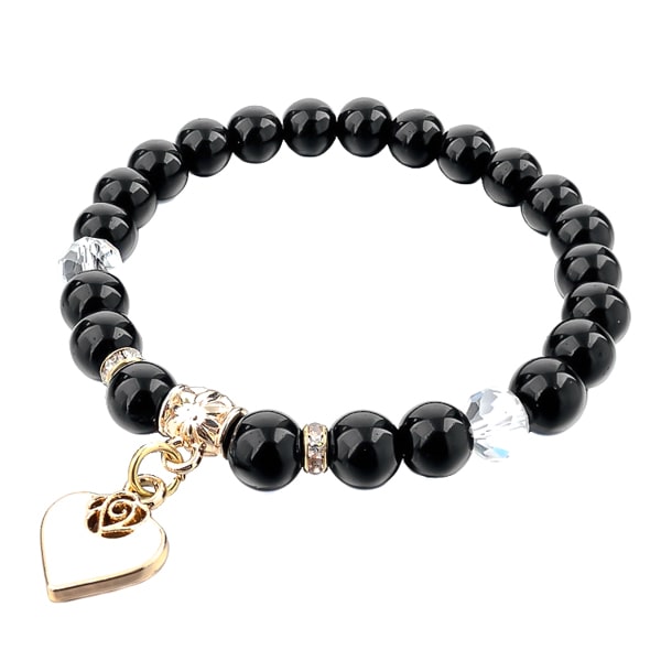 Beaded black obsidian bracelet with a gold heart charm