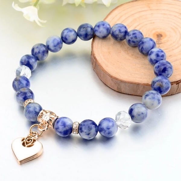 Blue natural stone bracelet with a gold heart charm