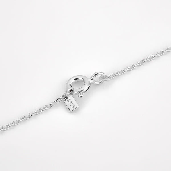 The clasp of the dainty sterling silver initial necklace