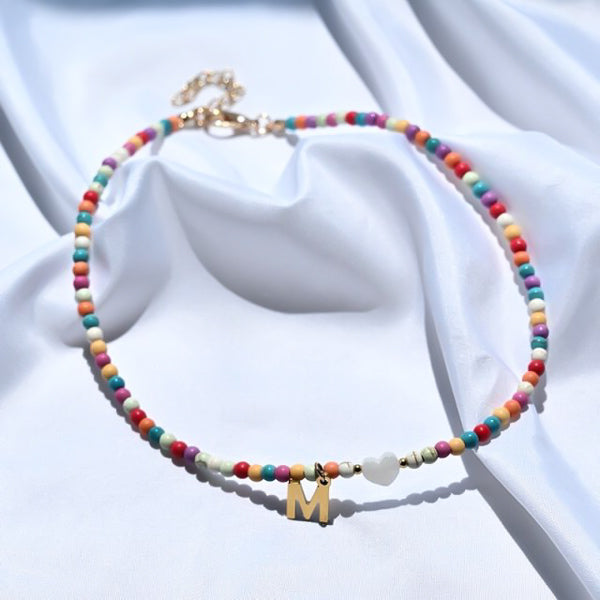 Colorful beaded choker necklace with gold initial letter charm pendant