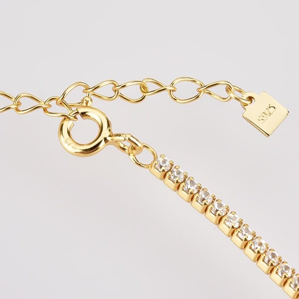 Details of the gold tennis choker necklace with white cubic zirconia stones