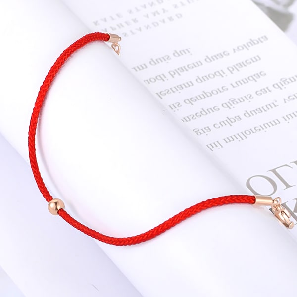 Dainty red rope bracelet close up details