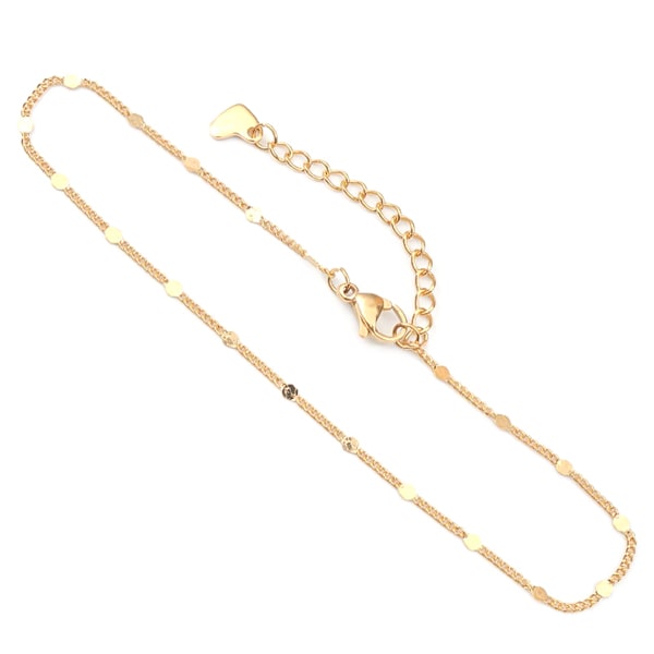 Delicate gold chain ankle bracelet details on a white background