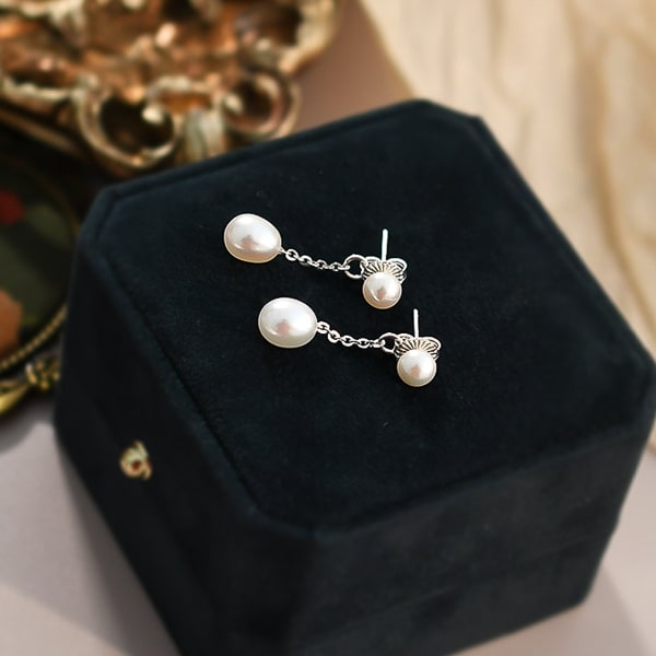 Double pearl drop stud earrings details