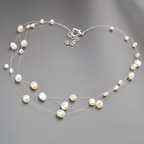Floating freshwater pearl necklace display
