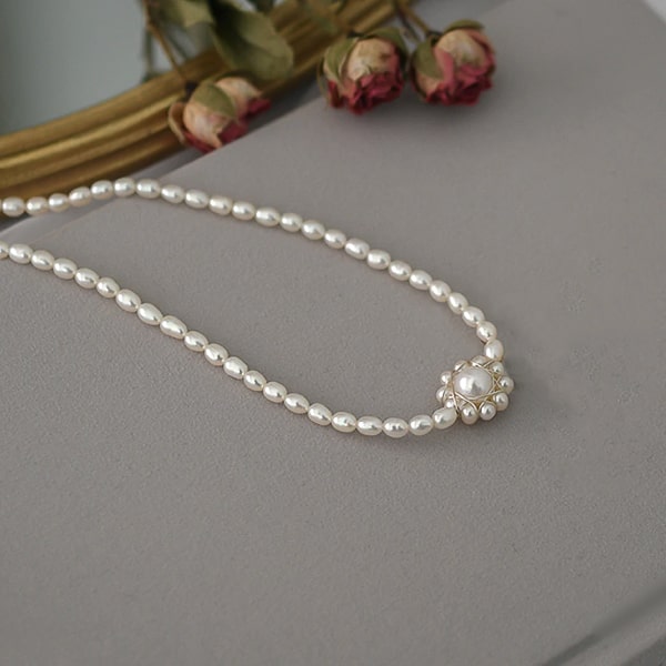 3-4mm oval pearl choker necklace with a flower ornament details