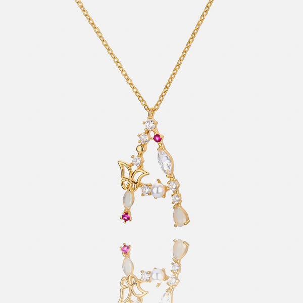 Girly initial letter necklace with gold butterflies and pink and white lab diamonds, opals, and pearls