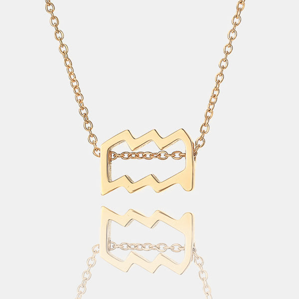 Gold Aquarius necklace details