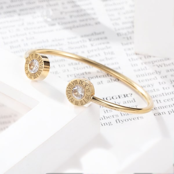 Gold Roman numeral open cuff bracelet with cubic zirconia diamonds