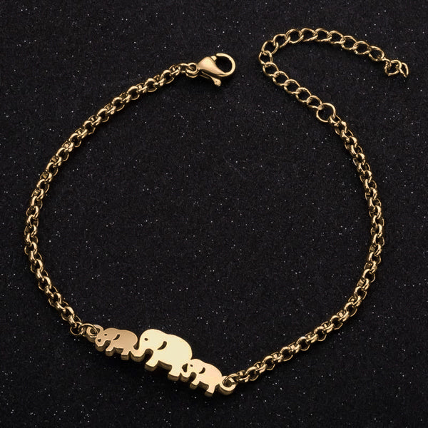 Gold elephant family bracelet with three elephants