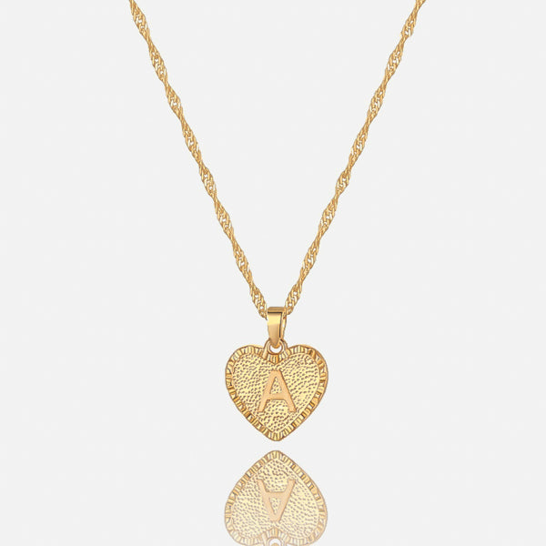 Gold necklace with initial heart pendant