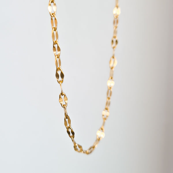 Gold lace chain choker necklace detail