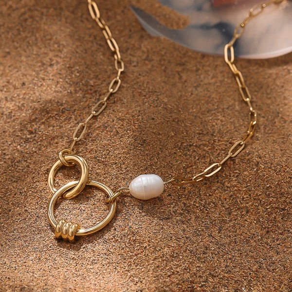 Gold circle pendant and white pearl on gold paperclip chain