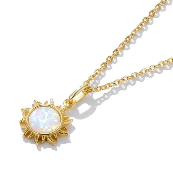 Gold opal sun pendant in a detailed image