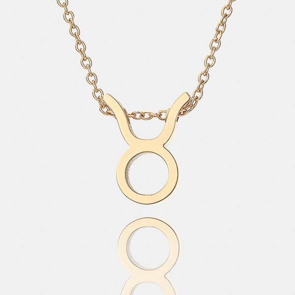 Gold Taurus necklace details