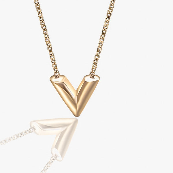 Gold V necklace display