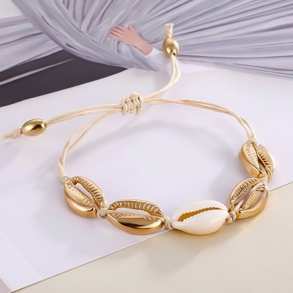Gold and white cowrie seashell bracelet for summer