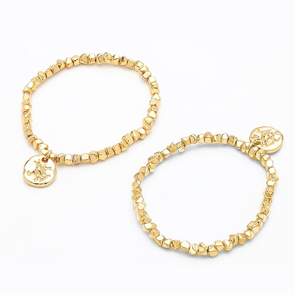Gold avant garde bracelet from different angles