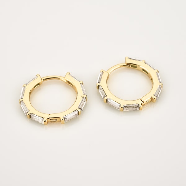 Gold baguette-cut crystal hoop earrings detail