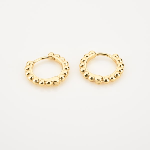 Gold bead huggie hoop earrings detail
