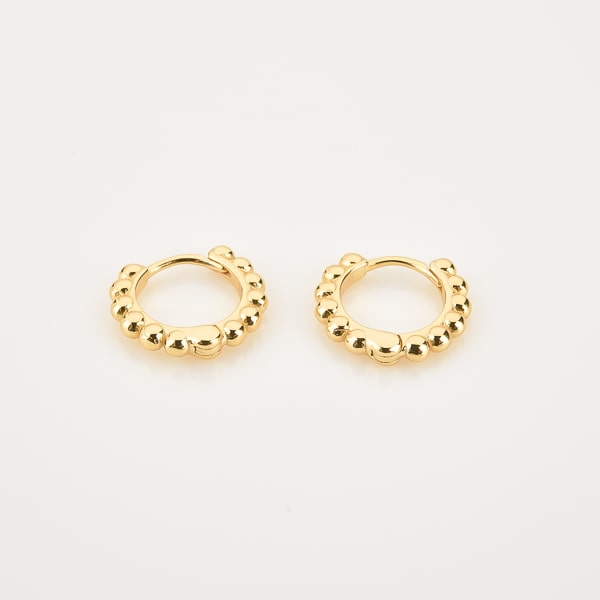 Gold bead mini huggie hoop earrings detail