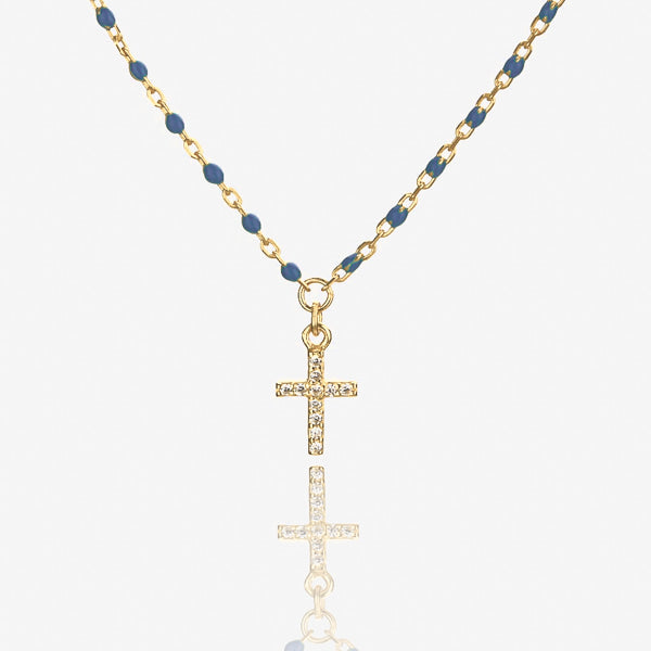 Gold necklace with blue beads and a crystal cross details
