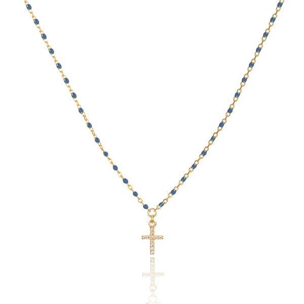 Gold necklace with blue beads and a crystal cross