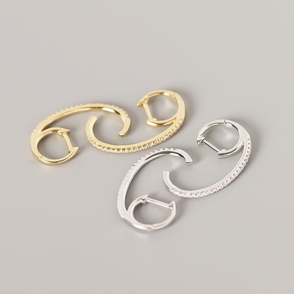 Details of the gold climber hoop earrings