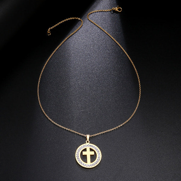 Gold crystal coin cross pendant necklace display