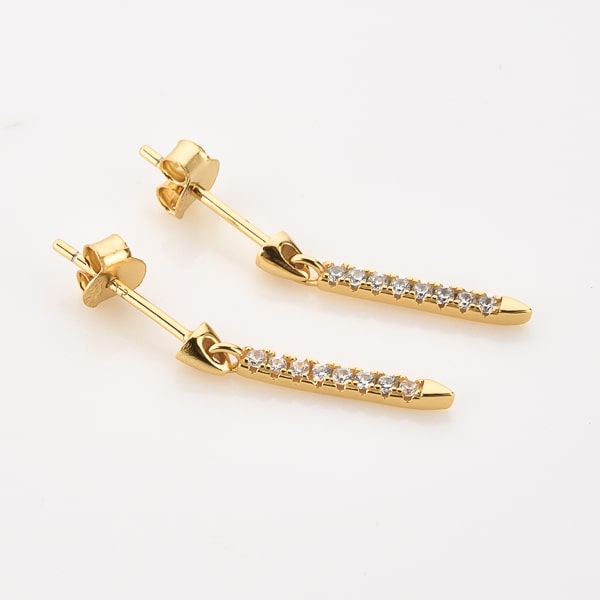 Gold crystal drop bar earrings detail