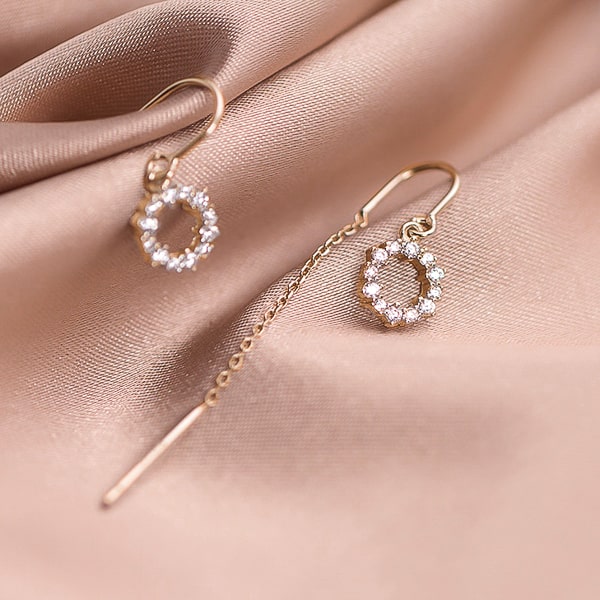 Gold crystal halo threader earrings detail