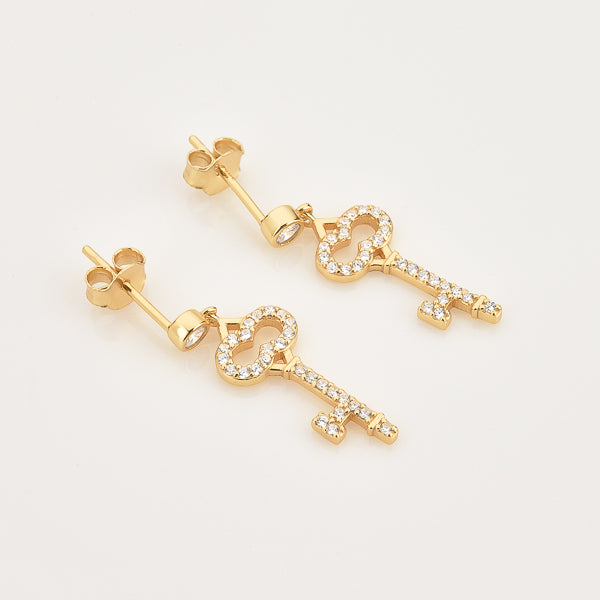Gold crystal key earrings details