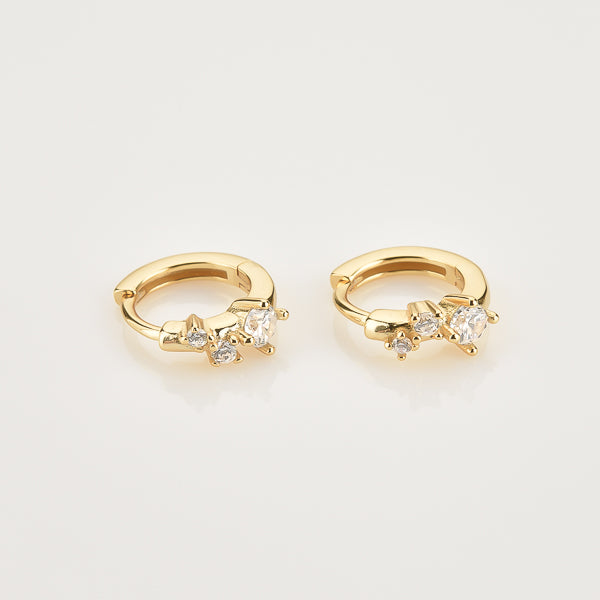 Gold crystal mini huggie hoop earrings details