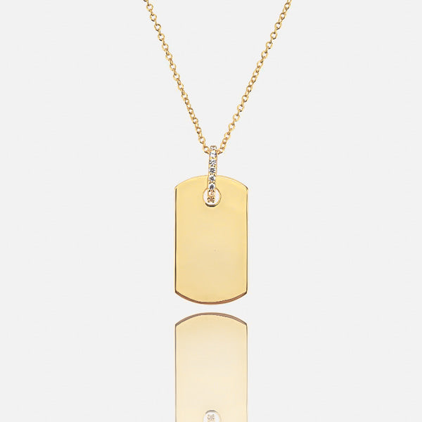 Gold dog tag necklace details