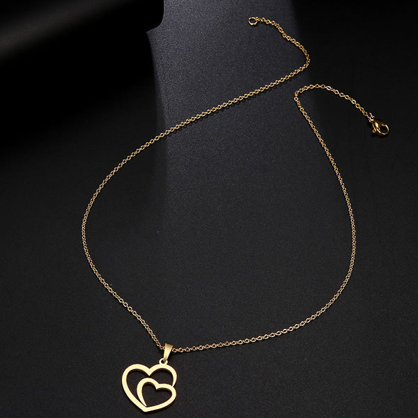 Gold double heart pendant necklace display