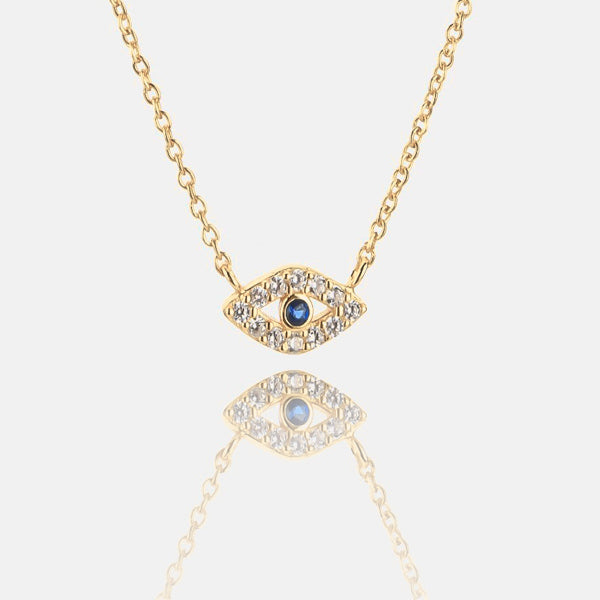 Gold eye necklace details