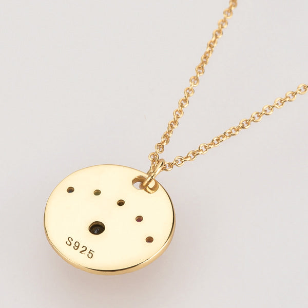 Gold eye of luck coin necklace backside details