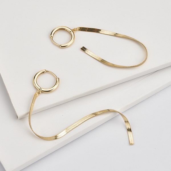 Gold herringbone chain earrings details