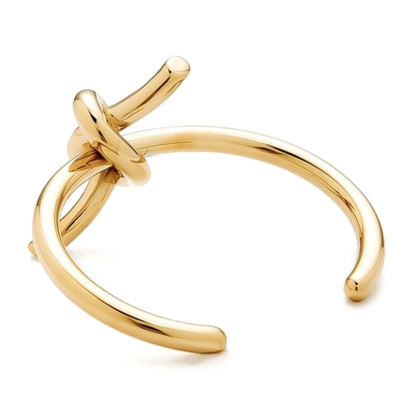Gold lace knot cuff bracelet viewed from side