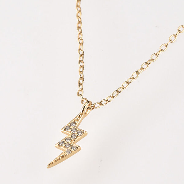 Gold lightning bolt necklace details