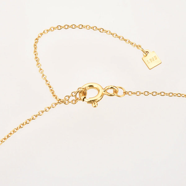 Gold mini lotus necklace lock display