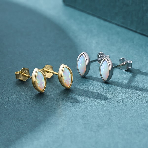 Gold mini marquise opal stud earrings detail