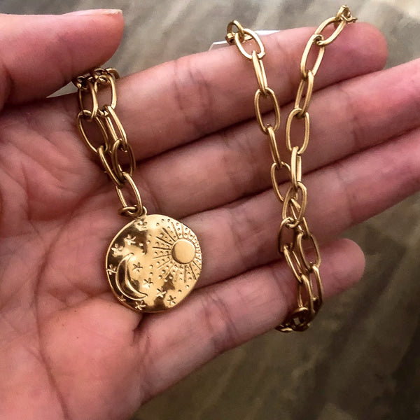 Gold moon & sun coin necklace display