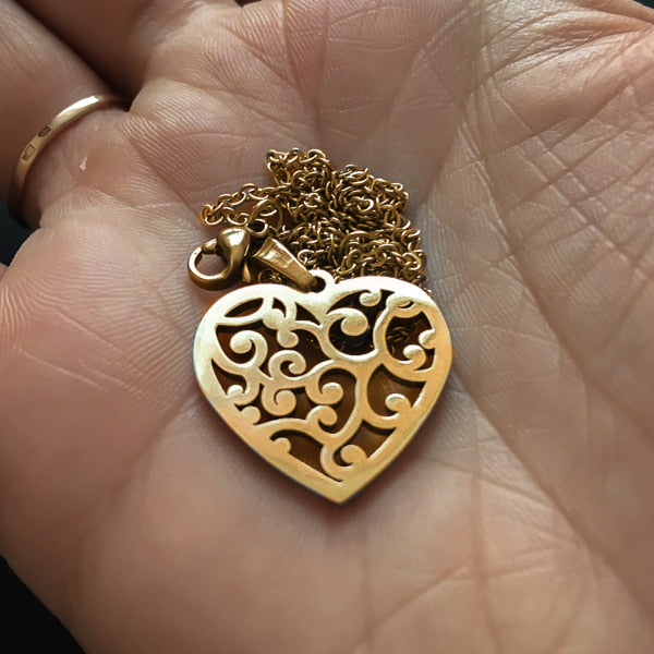 Gold mycelium heart pendant necklace display