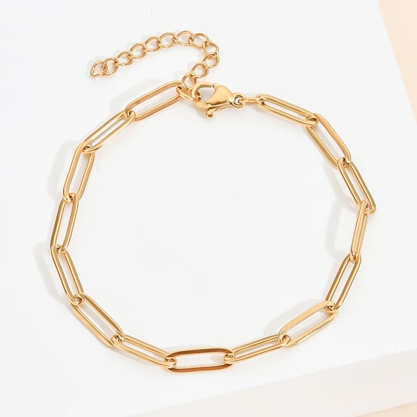 Gold oval link chain bracelet close up details