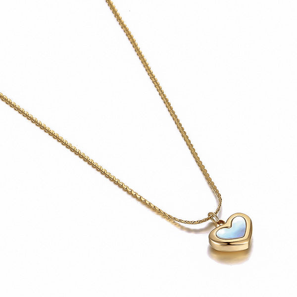 Gold shell heart pendant necklace display