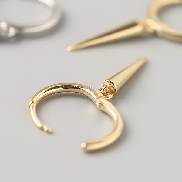 Gold single spike hoop earrings details