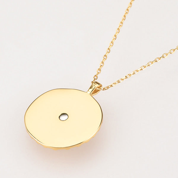 Gold sunrise coin necklace backside details